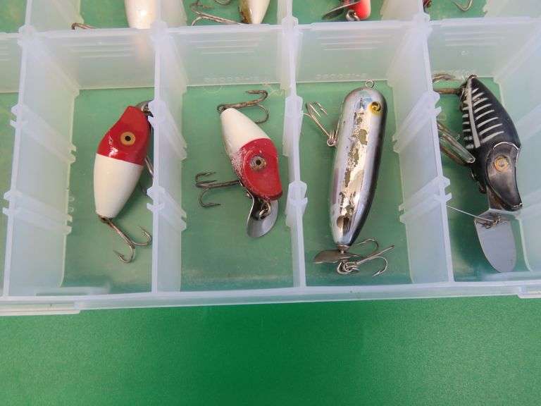 Eight Heddon Baits and a bait box, including River Runts, Midget Digits, and a Torpedo-style bait fr