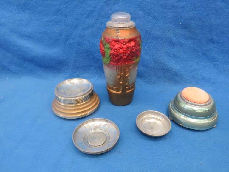 Two working music box/powder boxes and a painted glass vase/urn with lid