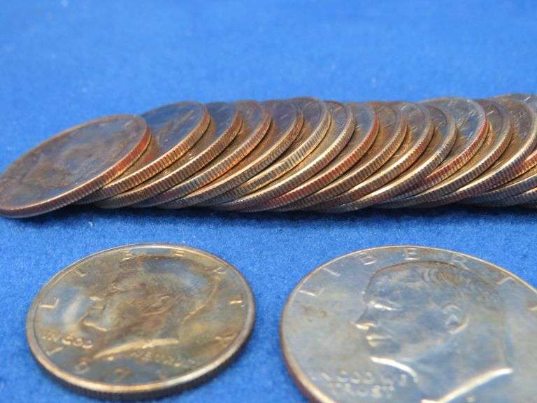 30 clad Kennedy halves and three Eisenhower dollars