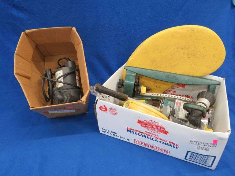 Yard care items such as sprinkers and sprayers, a submersible pump that powered up, and more