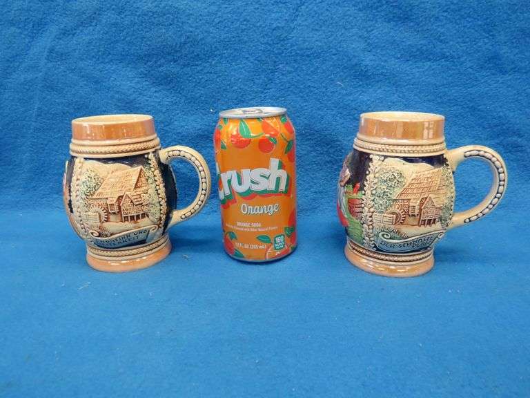 Three beer mugs and one stein