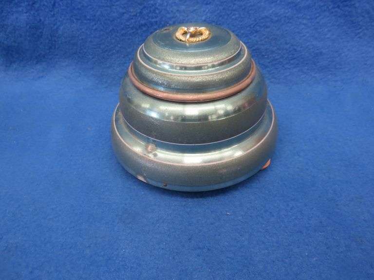 Two working music box/powder boxes and a painted glass vase/urn with lid