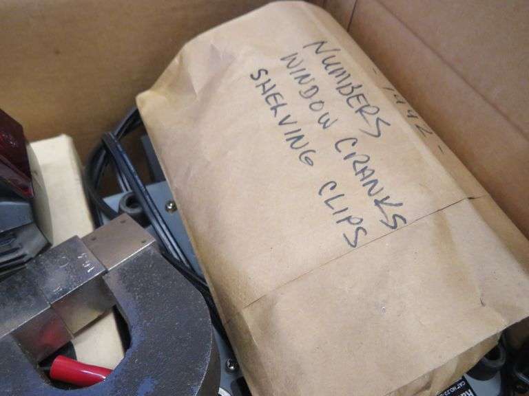 Vintage sabre saw and sander, battery charger, and more
