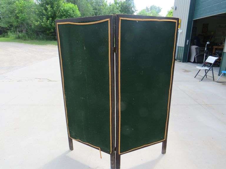 Old bifold painted canvas modesty screen.  Each of the two panels is 66" x 28".  Unsigned. Excellent