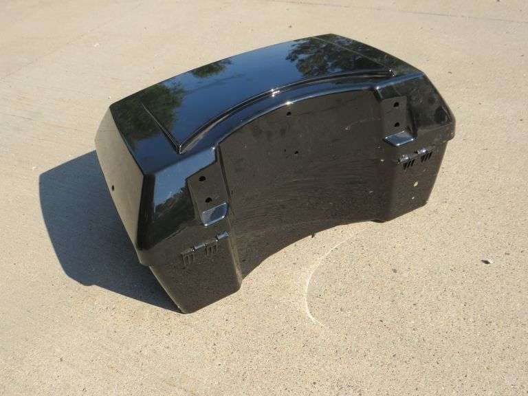 Never used motorcycle trunk and four traffic cones