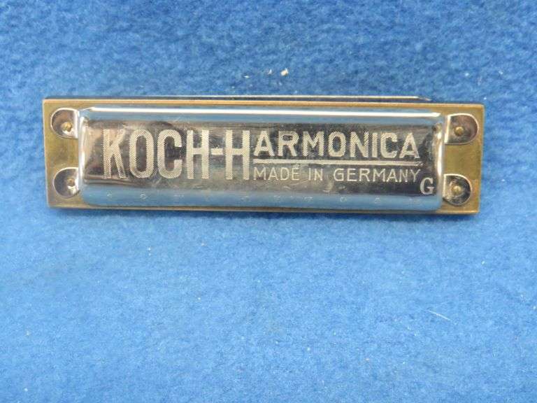 Koch like-new "Bugle Call" 10-hole diatonic harmonica in the key of G.  Sounds great.  Box is in exc