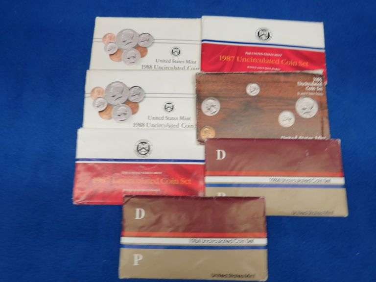 Seven Mint coin sets   (2) 1984 1985 (2) 1987 (2) 1988
