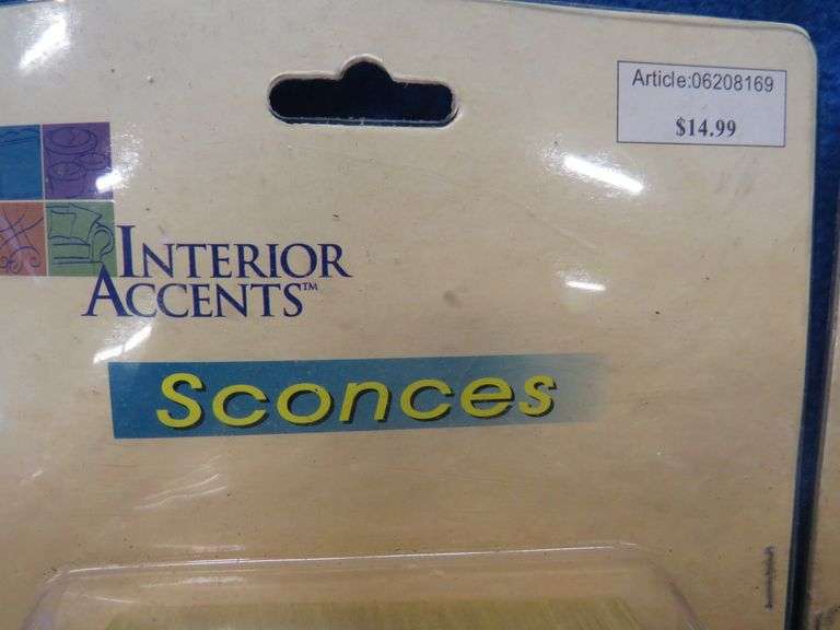 Four new-in-the-package sconces