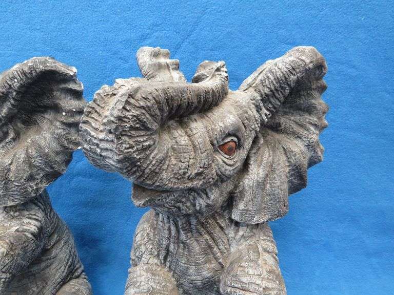 Pair of plaster elephants named Larry and Ryan.  Some small nicks.