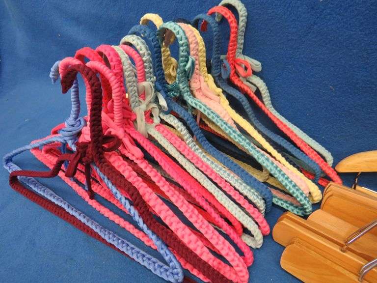 George Foreman grill including scraper and two drip trays also 18 wrapped clothes hangers with 12 pa