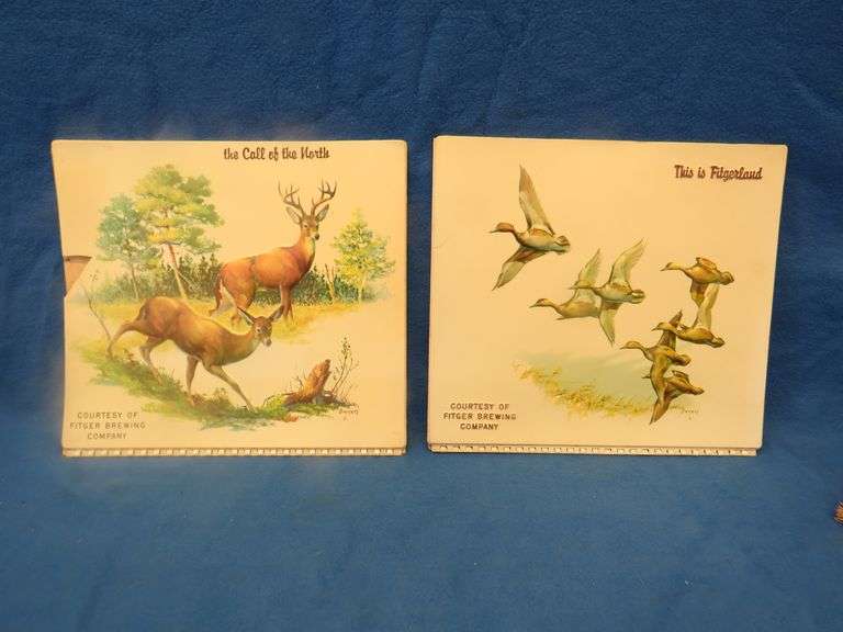 Two Fitger's Beer vacuform calendar toppers with damage as pictured
