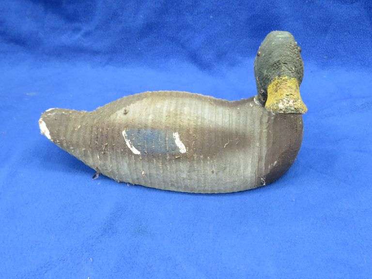 Vintage wooden duck decoy with glass eyes