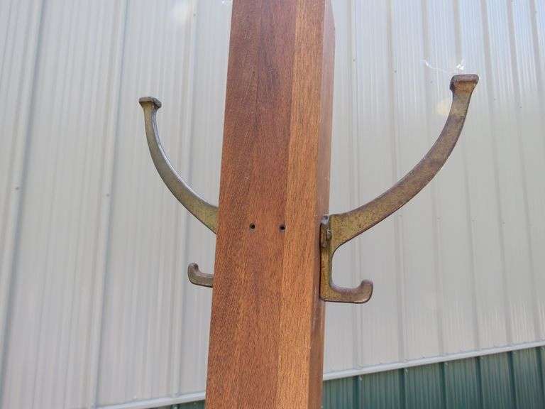 Wooden three-tiered stand 15"W x 38"H x 15"D and a coat tree. Needs two hooks