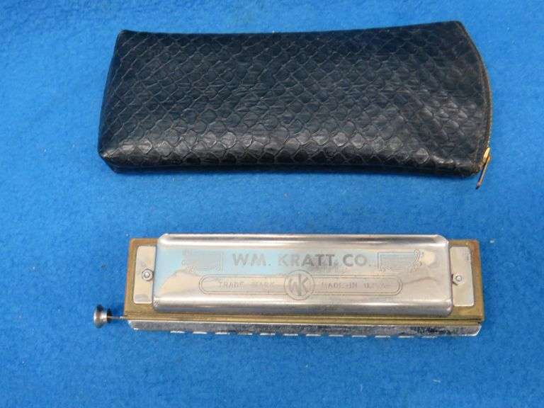 Wm. Kratt Super "48" chromatic harmonica with a soft case