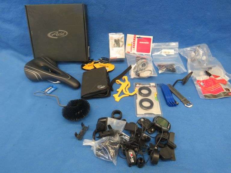 Bicycle parts old and mostly new including a Velo Giant seat, cables, and much more