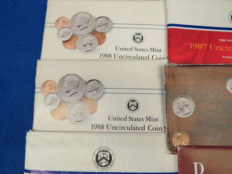 Seven Mint coin sets   (2) 1984 1985 (2) 1987 (2) 1988