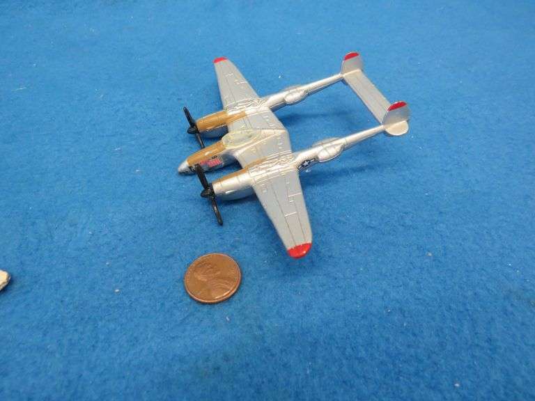 Three die-cast airplanes