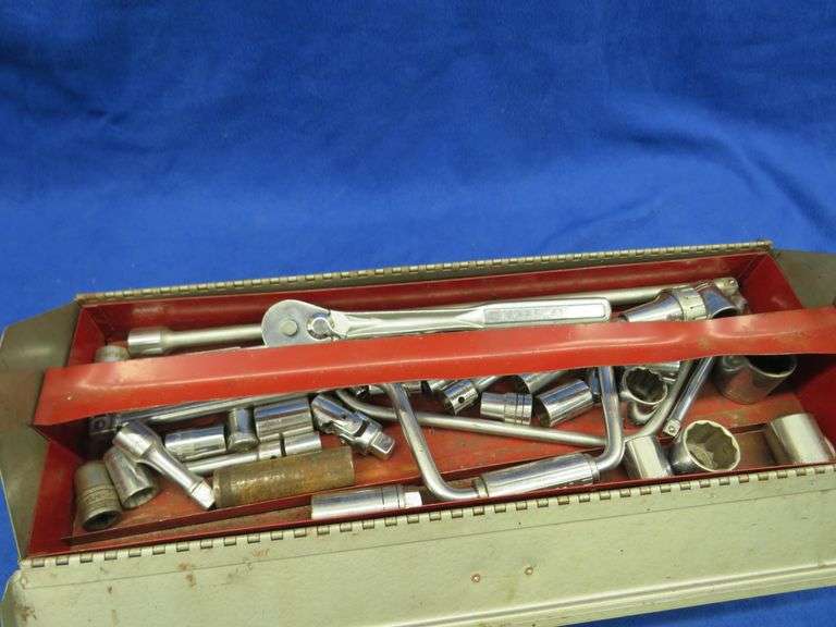 Metal toolbox with contents, including many Craftsman sockets,  ratchets, extensions, and more inclu
