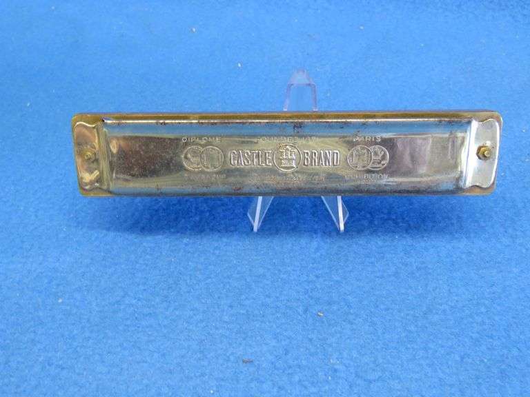 Johann Schrunk Castle Brand tremolo key of C harmonica with 20 holes.