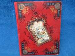Two scrapbooks filled with postcards, greeting cards. tobacco cards, and more