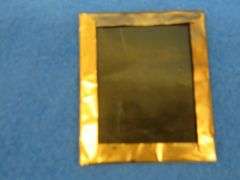 Antique tintype photo in a locking case.  Very good condition.