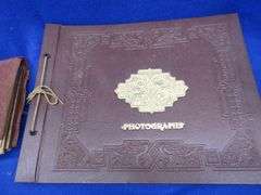Three vintage photo albums. One has over 500 photos or postcards of bridges. Two are unused