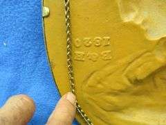 Embossed Bradley and Hubbard #1820 cast iron oval portrait