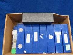 Coin collector organizer kit that includes 15 plastic divider trays for slabbed coins, coin tubes, a