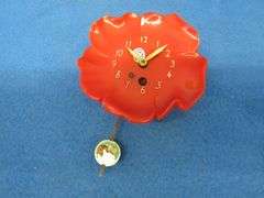 Four clocks for parts or repair.[ The large rectangular clock and the small round brass clock are Lu
