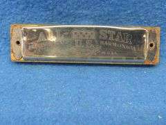 Harmonic Reed Co. All-Star 10-hole diatonic harmonica.  Sounds great.  Has some surface rust.