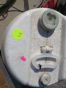 Genie 1.5-gallon shop vacuum, plastic container, and a shop stool