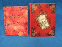 Two scrapbooks filled with postcards, greeting cards. tobacco cards, and more