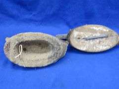 Two vintage duck decoys, one cork and one wooden with glass eyes