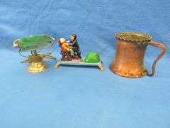 Large copper mug, small office lamp, and a dental-themed mechanical bank from Taiwan