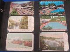 Three vintage photo albums. One has over 500 photos or postcards of bridges. Two are unused