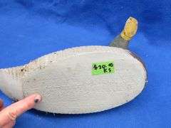 Vintage wooden duck decoy with glass eyes