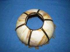 14" caramel slag glass shade with beaded fringe.  Very good condition.