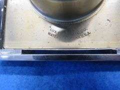 Four clocks for parts or repair.[ The large rectangular clock and the small round brass clock are Lu