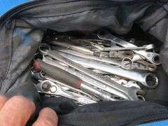Two tool bags with contents including Snap-On, Craftsman, Husky, and more