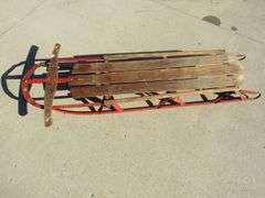 Vintage Champion F-56 steel runner sled.  56"