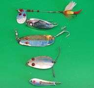 Mixed spoons including Herter's Barbary Coast