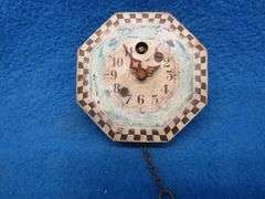 Four clocks for parts or repair.[ The large rectangular clock and the small round brass clock are Lu