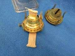 Two kerosene lamps with shades and two extra burners