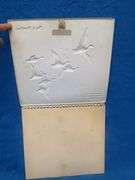 Two Fitger's Beer vacuform calendar toppers with damage as pictured