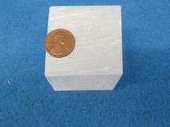 Honey Calcite Sphere and a Satin Spar Cube.  Total weight 1.15 lb.