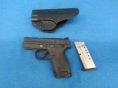 Smith and Wesson MP9 Shield 9mm semi-auto pistol.  SN HAP2821.  Includes two magazines and a molded 