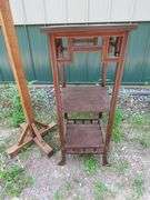 Wooden three-tiered stand 15"W x 38"H x 15"D and a coat tree. Needs two hooks