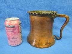 Large copper mug, small office lamp, and a dental-themed mechanical bank from Taiwan