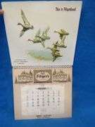 Two Fitger's Beer vacuform calendar toppers with damage as pictured