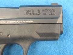 Smith and Wesson MP9 Shield 9mm semi-auto pistol.  SN HAP2821.  Includes two magazines and a molded 